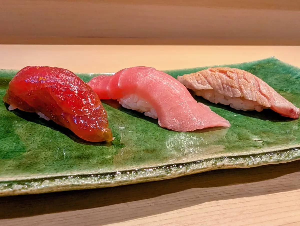 Omakase at REONA Sushi Tokyo features a premium Maguro (tuna) tasting of various high-quality cuts.