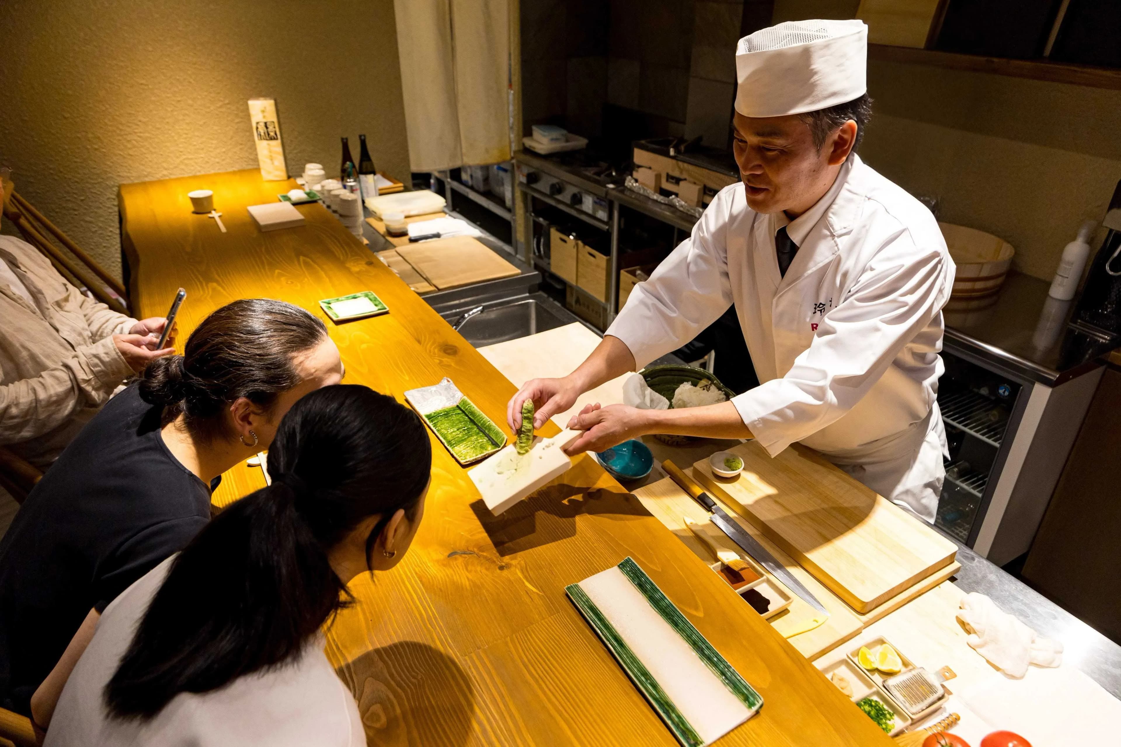 Fresh wasabi grated for omakase sushi at REONA Tokyo